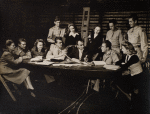Moss Hart (center holding script) with cast during rehearsals for the stage production Winged Victory