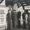 Service men entering the Stage Door Canteen.