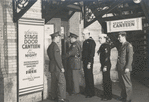 Service men entering the Stage Door Canteen.