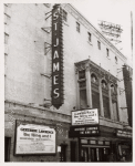 Exterior view of St. James Theatre and its marquee promoting Gertrude Lawrence in the stage production "The King and I."