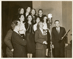 Kay Thompson and Her Rhythm Singers performing on a radio program.