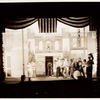 June Walker playing trombone and unidentified cast members in the stage production Processional