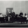 George Stillwell (center), Zita Johann as secretary (extreme left), and other cast members in the stage production Machinal