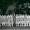 Joe E. Brown and chorus girls in the stage production Twinkle, Twinkle