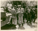 Joe E. Brown handing out mail to troops, Luzon, Philippines