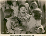 Joe E. Brown and unidentified children in the motion picture Painted Faces