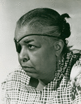 Portrait of Ethel Waters wearing an eyepatch.