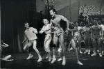 Jack Cassidy, Sheila Bond, John Perkins and chorus boys dressed in gym shorts in Wish You Were Here.