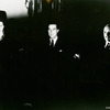 Ray Milland (center) with unidentified actor and actress in the motion picture Ministry of Fear.