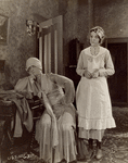 Reginald Denny (in drag) and Zasu Pitts in the silent motion picture What Happened to Jones