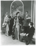 Polly Rowles, John O'Hare, Rosalind Russell, Cris Alexander, and Jan Handzlik (seated) in the stage production Auntie Mame
