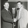 Publicity photo of Arthur Godfrey and an unidentified winner from the radio version of Arthur Godfrey's Talent Scouts.