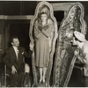 Moss Hart, in wheelchair, with two unidentified others and a coffin (The Man Who Came To Dinner)