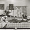 Gertrude Lawrence and Noel Coward on sofa in "Private Lives."
