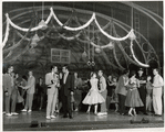 Mickey Calin, Ken LeRoy, and ensemble in the stage production West Side Story