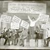 Philip Loeb and unidentified cast holding picket signs in a scene from Let 'Em Eat Cake