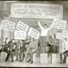 Philip Loeb and unidentified cast holding picket signs in a scene from Let 'em Eat Cake