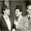 Philip Loeb (center) and unidentified actors in the stage production My Sister Eileen.