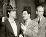 Philip Loeb (center) and unidentified actors in the stage production My Sister Eileen.