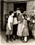 Lester Carr, Philip Loeb, Gertrude Berg and Joan Lazer in the stage production Me and Molly (set design by Oliver Smith)