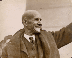 Eugene V. Debs waving, close-up, facing camera