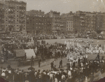 Large group of spectators watching dancers