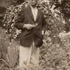 Frank J. Sprague standing in Harriet Ford's garden, Milford, Connecticut