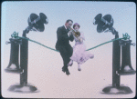 Man and woman sit on telephone wire