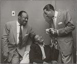 Count Basie, Billie Holiday and Billy Eckstine, holding Holiday's chihuahua "Peppy" 