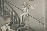Bill Rose's night club. Dancer on stairs, backstage.