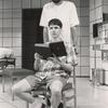 Jonathan Hadary (standing) and John Camero (sitting) in the stage production The Destiny of Me.