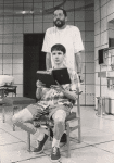 Jonathan Hadary (standing) and John Camero (sitting) in the stage production The Destiny of Me.