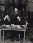Robert E. Sherwood (standing) together with Alfred Lunt and Lynn Fontanne during rehearsal for There Shall Be No Night.