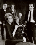 (Clockwise from bottom left) Patricia Roe, Danny Sewell, John Harkins, Denis Holmes, Lloyd Battista, and William Roerick in the stage production The Homecoming