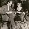 Robert Taylor and unknown actress.