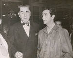 Robert Taylor (right, retired) and Senator Edwin C. Johnson (left, D-Colo) at cocktail party in Rome.