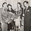 Robert Taylor (at far right) with unidentified people at CBS Radio.