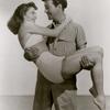 Unknown actress and Robert Taylor