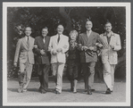 Publicity photo of director Reginald Denham, producer Bill Doll, Jack Raine, playwright Ouida Rathbone, Basil Rathbone, and unidentified man from the stage production Sherlock Holmes