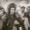 Anna Magnani surrounded by crowd in the motion picture Ways of Love aka L'amore