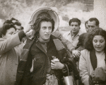 Anna Magnani surrounded by crowd in the motion picture Ways of Love aka L'amore