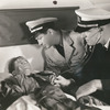 Shepperd Strudwick, Robert Taylor, and unidentified actor in the motion picture Flight Command