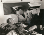Shepperd Strudwick, Robert Taylor, and unidentified actor in the motion picture Flight Command