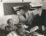 Shepperd Strudwick, Robert Taylor, and unidentified actor in the motion picture Flight Command