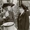 Greer Garson and Billy Bevan in the motion picture Mrs. Miniver