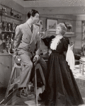 Robert Taylor and Billie Burke in the motion picture Remember?