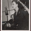 Jane Frohman in uniform facing microphone
