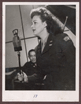 Jane Frohman in uniform facing microphone