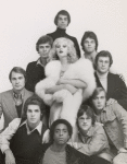 Candy Darling encircled by nine men (Robert Christian bottom center)
