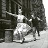 Carol Lawrence and Larry Kert running down the street in promotional photo for West Side Story.